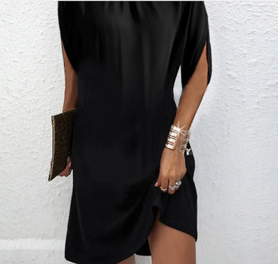 Black midi dress with high collar and slit sleeves