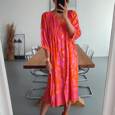 Midi dresses with front buttons in warm pink and orange