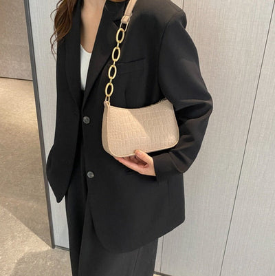Magnella  Elegant shoulder bag in crocodile-embossed design
