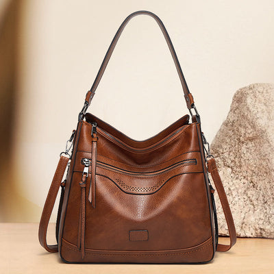 Malbjorg  Elegant shoulder bag with a wave design