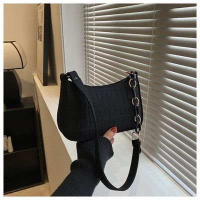 Magnella  Elegant shoulder bag in crocodile-embossed design