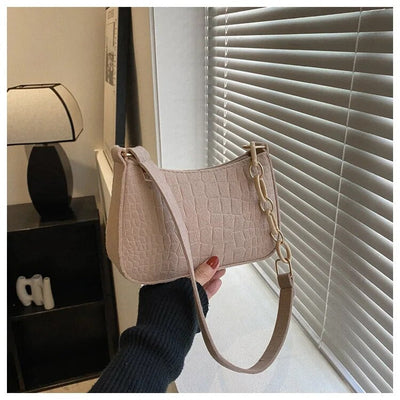 Magnella  Elegant shoulder bag in crocodile-embossed design