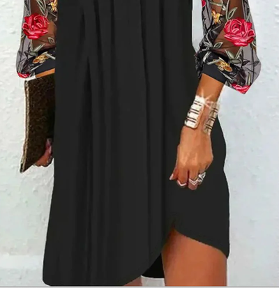 Mini dress with sheer sleeves and V-neck